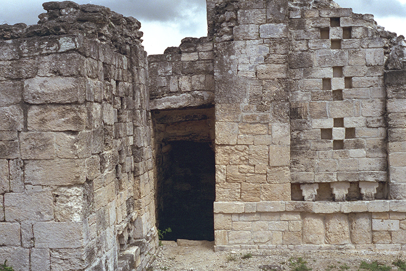 Courtyard atop of Str. IV showing doorway to interior stairwaya