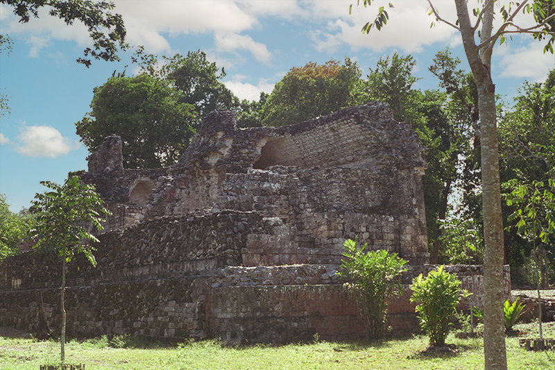 View of the collapsed rear section of Structure II showing interior room dimensions and masonry