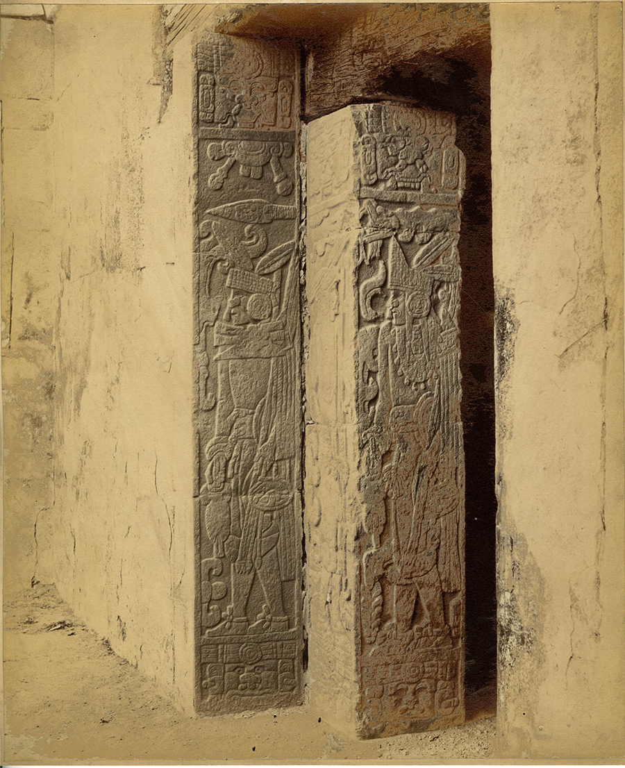 1889 photo, detai carving on doorjambs into inner chamber, Upper Temple of the Jaguar, Chichén Itzá