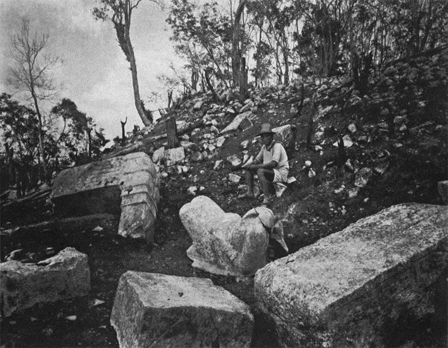Maudslay’s 1889 photo of the ruinous state of Temple of the Warriors, with serpent tails and headless Chac Mools strewn over the pyramid base