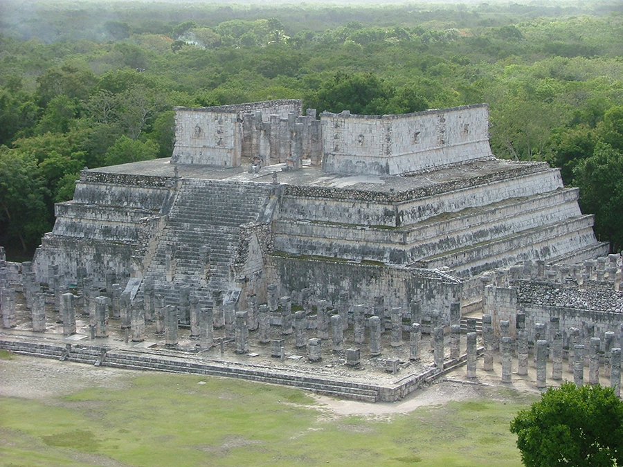 Photo of the Temple of the Warriors seen from El Castillo