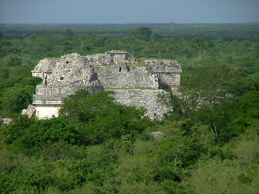 El Caracol as seen from El Castillo, with El Caracol partially obscuring La Monjas behind it