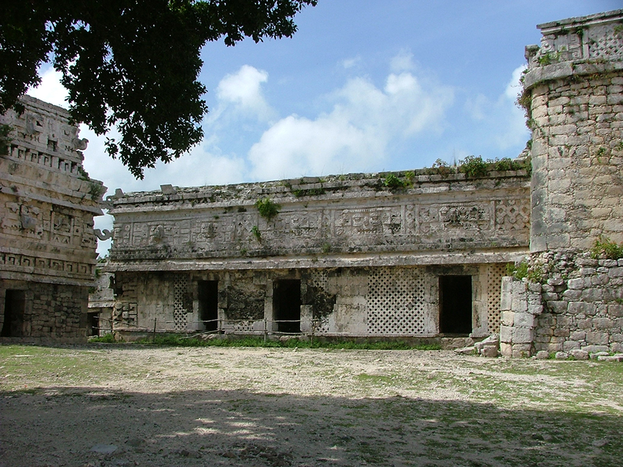 The small courtyard formed by the eastern wing of Casa de Monjas and La Iglesia at Chichen Itza
