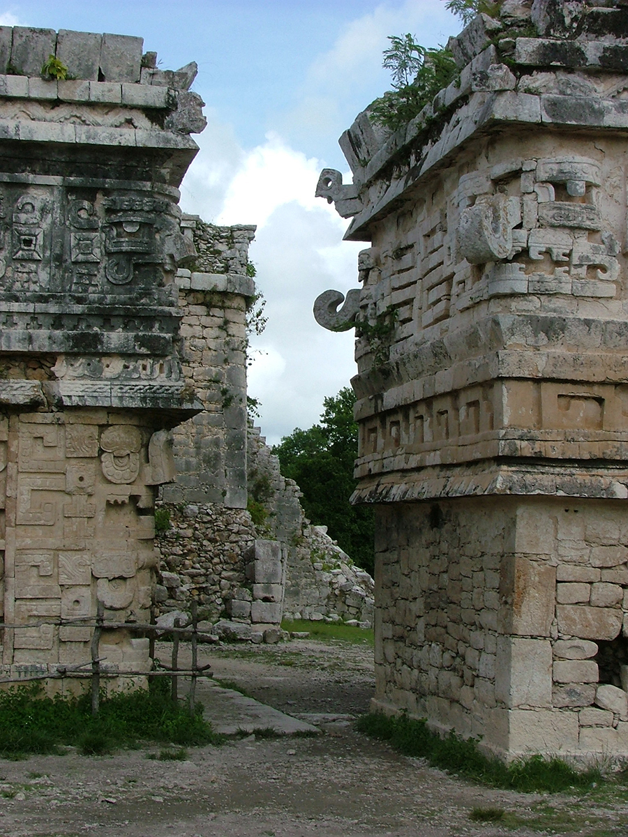 Puuc style Chaac masks decorate the medial molding of La Iglesia and Casa de Monjas at Chichen Itza
