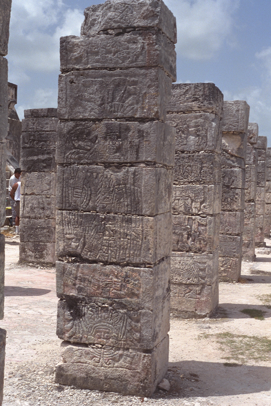Detail showing the Toltec warriors carved into the rectangular square columns fronting the Temple of the Warriors