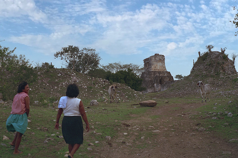 Dzibilnocac: Local Maya women shooed away the cows so we could enter the ruins