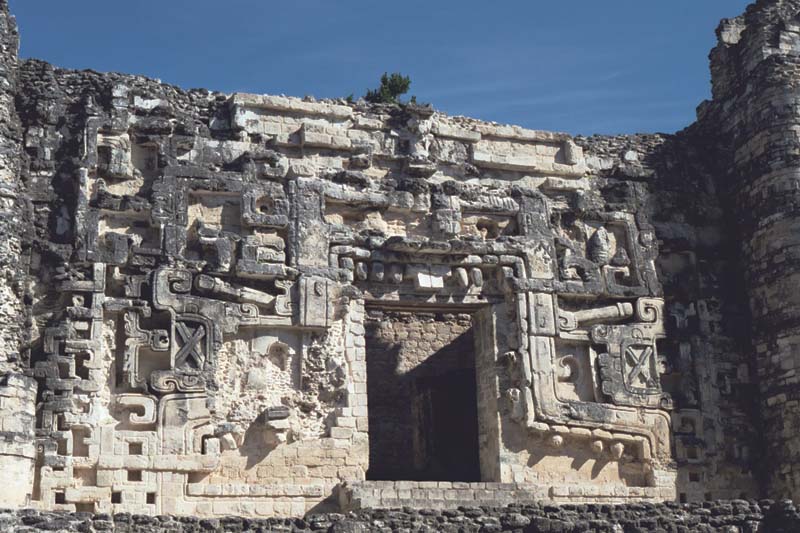 Itzamna image merging with profile serpents on Structure II