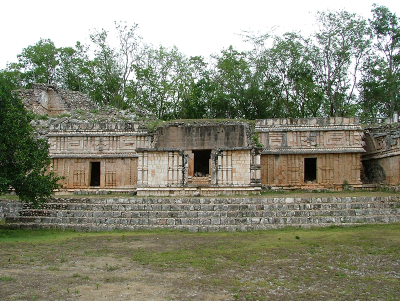 Room 23, the antichamber of the Old Palace Throne Room at Labna showing nosed masks