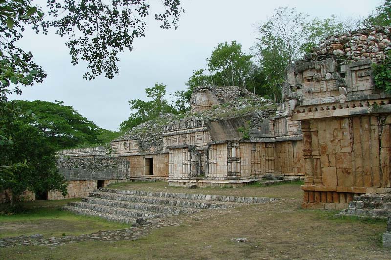 Central Patio of the Palace of Labna, showing the oldest building, throne room steps, and later building stages
