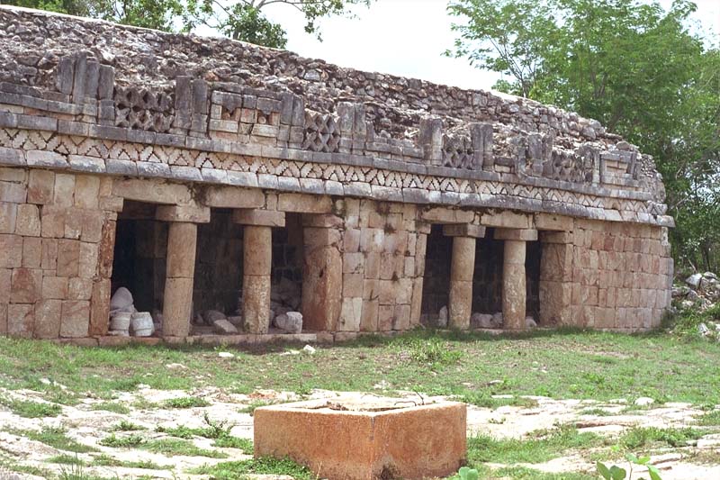 Second story of the Palace of Labna with a Chultun in the foreground