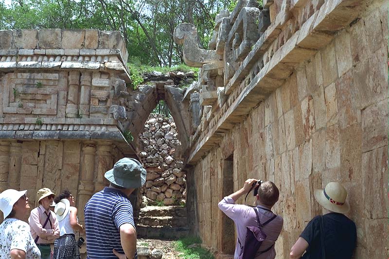 Glyphic inscriptions on Chaac mask nose contains dedication date of last throne room of Palace