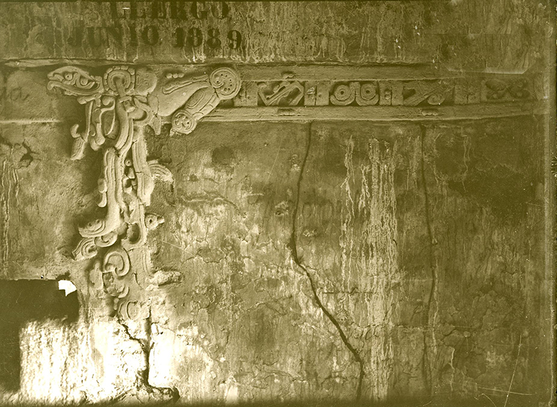 Stucco decoration over door in House E