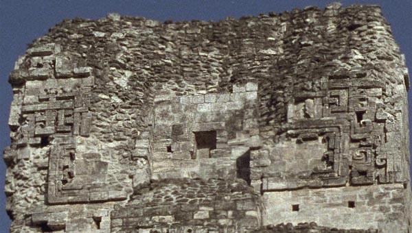 Closeup of the false temple atop Xpujil Structure I showing profile masks