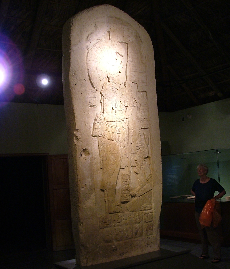 Full view of Stela 1 Side B including a small figure at the feet