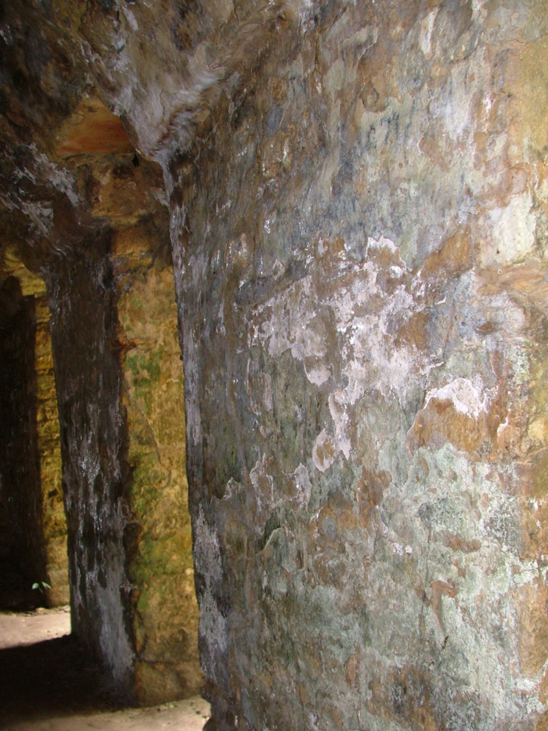 View emerging from the dark Labyrinth into the Great Plaza