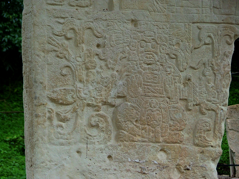Closeup of the lower register of Stela 1 showing a monster mask