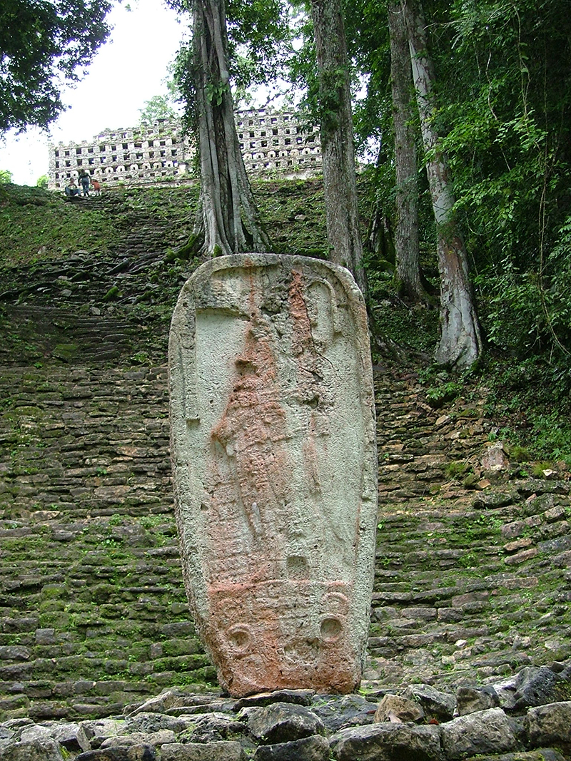 Stela 2 standing near the base of the stairway to Structure 33