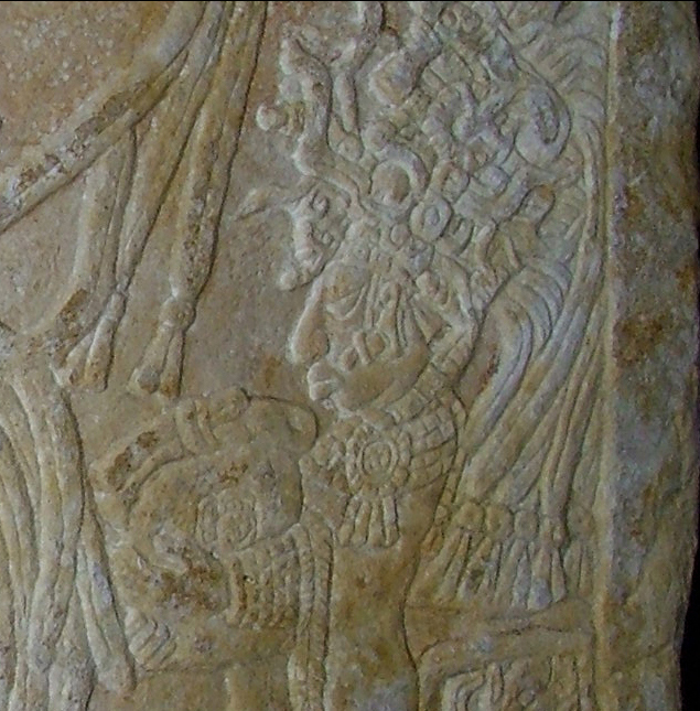 Detail of Lintel 1 showing the Queen holding a bundle