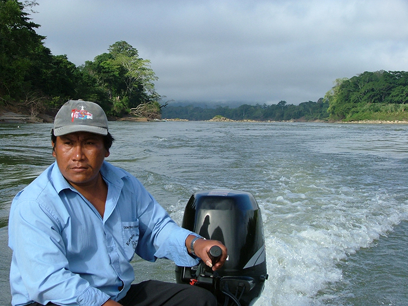 Ch'ol Maya boatman steering the lancha engine