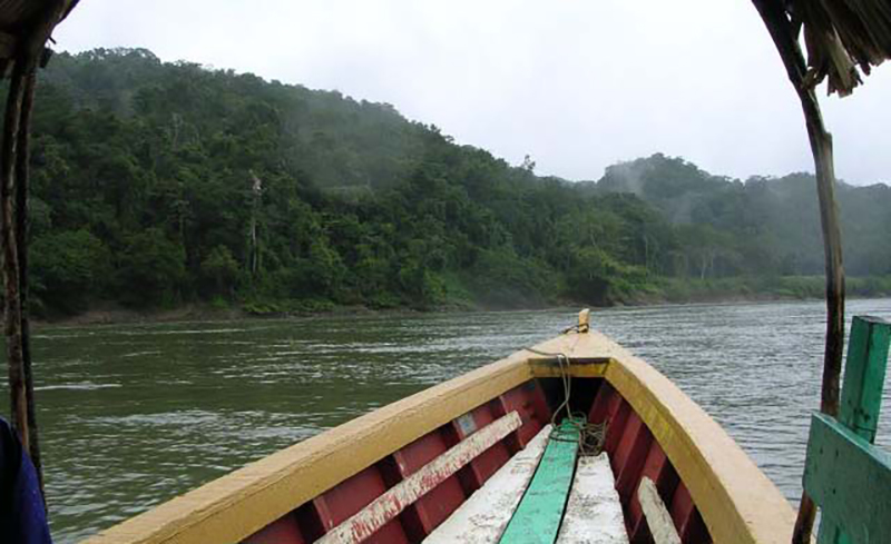 Wide view of the Usumacinta River with boats in transit