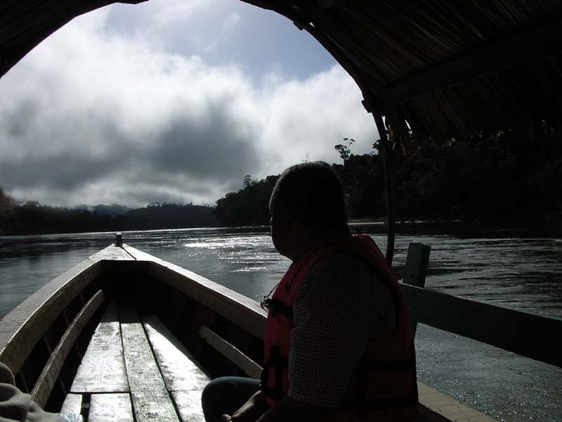 Approaching the ruins of Yaxchilan by boat around an oxbow bend